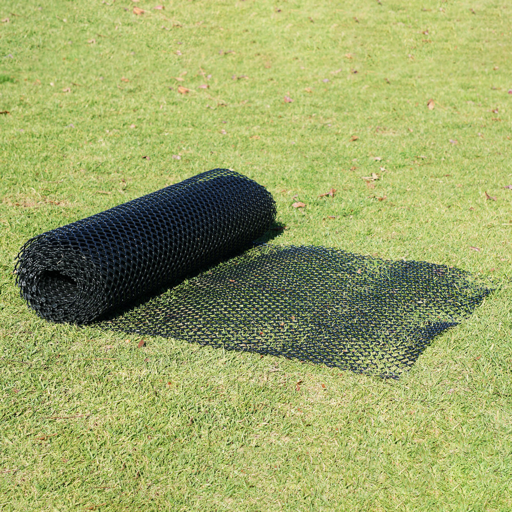 Black TR4 mesh roll laid out on grass
