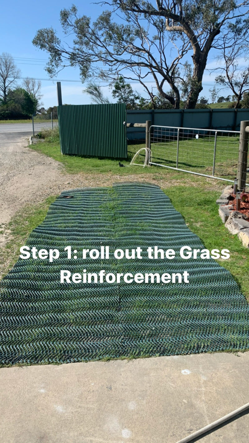 Green reinforcement mesh rolled out across the lawn near the Turfmate gate.