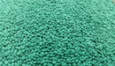 Close-up of coated Pure Kikuyu lawn seed